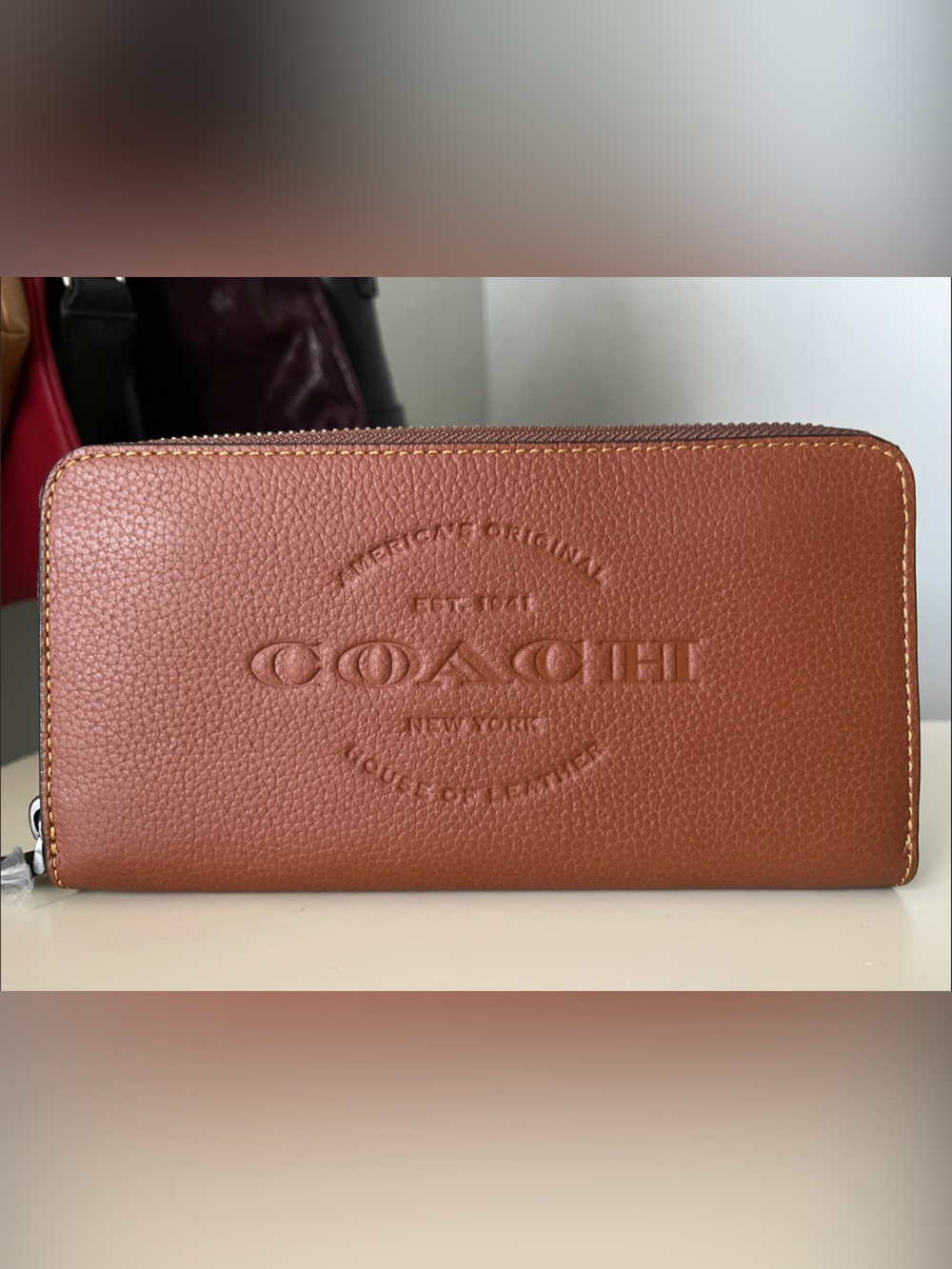 Coach Pebbled Zip-Around Wallet in Cognac Brown